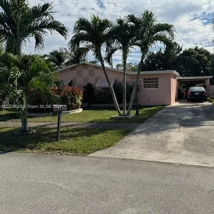 Buy this 4 bed house on 6570 Nw 6th Ct in Margate, Florida