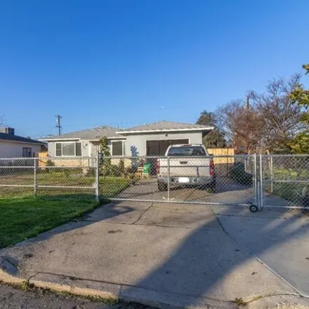 Buy this 3 bed house on 1338 Dellavalle Avenue in Madera, CA 93638
