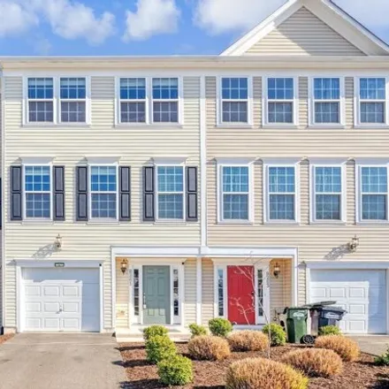 Rent this 4 bed condo on Heritage Crossing Court in Prince William County, VA 20109