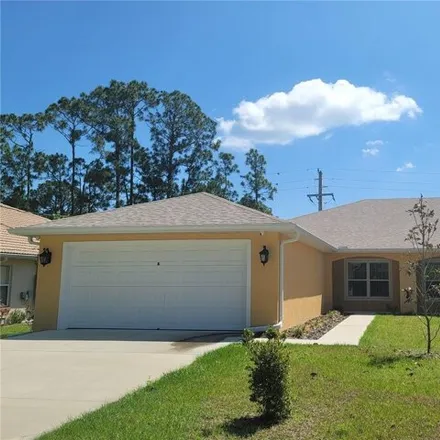 Rent this 8 bed house on 157 Fenimore Lane in Palm Coast, FL 32137