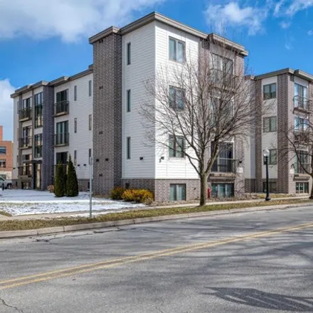 Buy this 1 bed condo on Old Town Parking Deck in 125 East Eighth Street, Traverse City