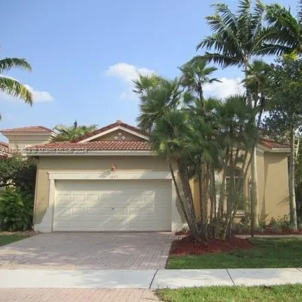 Rent this 3 bed house on 5869 Northwest 120th Avenue in Heron Bay South, Coral Springs