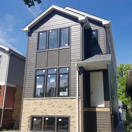 Buy this 4 bed house on 6640 North Octavia Avenue in Chicago, IL 60631