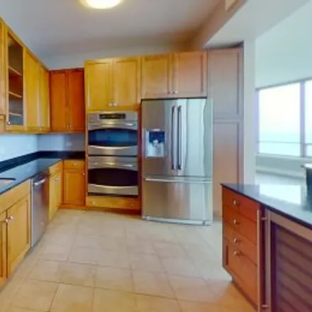 Rent this 3 bed apartment on #2004,600 North Lake Shore Drive in Streeterville, Chicago