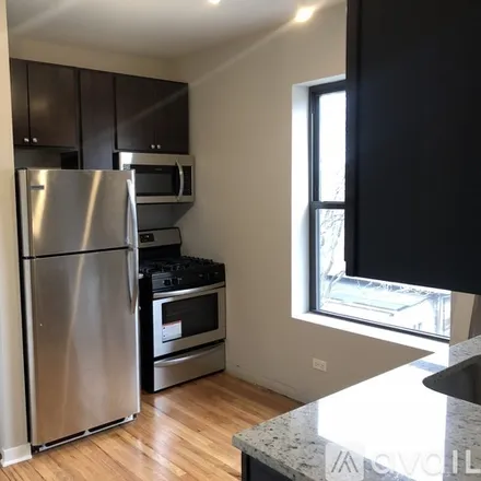 Rent this 2 bed apartment on 4819 N Christiana Ave