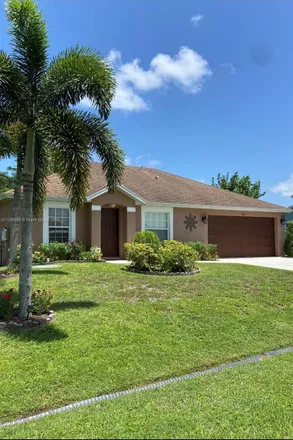 Buy this 3 bed house on 611 Southwest Addie Street in Port Saint Lucie, FL 34983