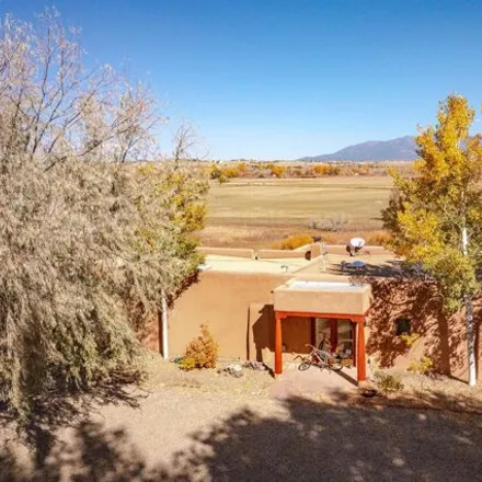 Buy this 4 bed house on 622 Delores Road in Taos County, NM 87571