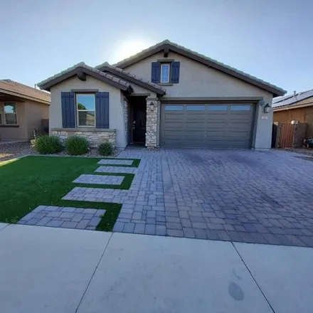 Rent this 3 bed house on 704 North 152nd Drive in Goodyear, AZ 85338