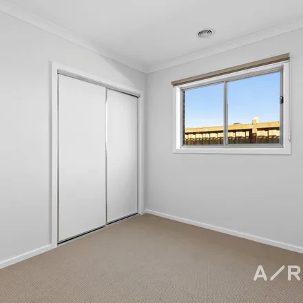Rent this 4 bed apartment on Spinifex Road in Fraser Rise VIC 3336, Australia