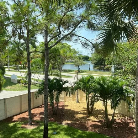 Rent this 2 bed apartment on 3080 Country Club Boulevard in The Lakes of Deer Creek, Deerfield Beach