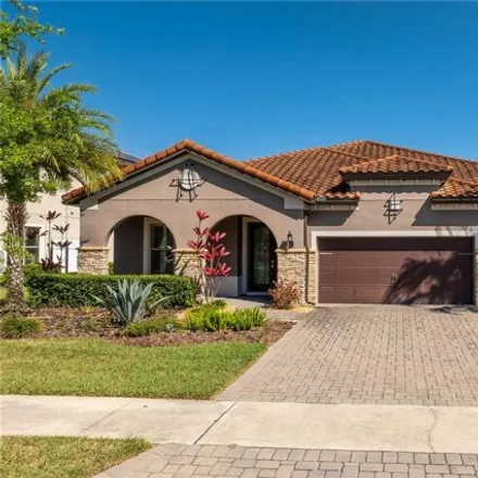 Rent this 4 bed house on 10899 Savona Way in Orlando, FL 32827