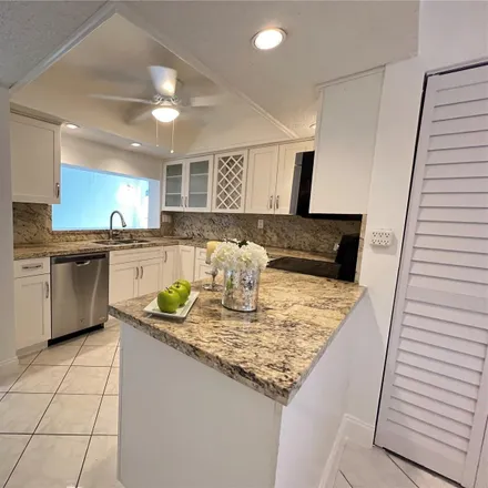 Rent this 3 bed condo on 1822 Sable Palm Drive in Pine Island Ridge, Davie
