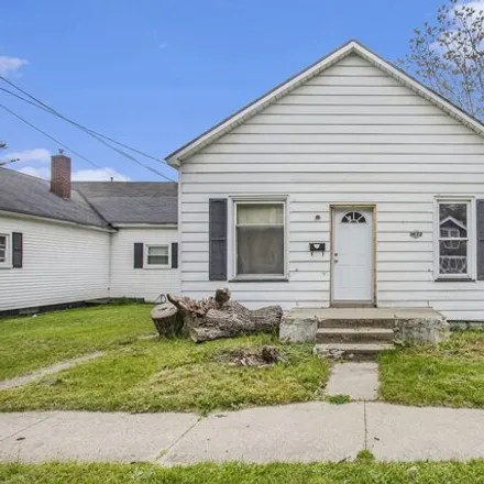 Buy this 3 bed house on 1483 Division Street in Muskegon, MI 49441