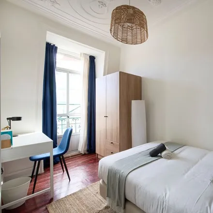 Rent this 8 bed room on Rua Francisco Sanches