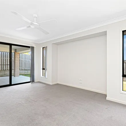 Rent this 4 bed apartment on 61 Chelsea Crescent in Bridgeman Downs QLD 4035, Australia