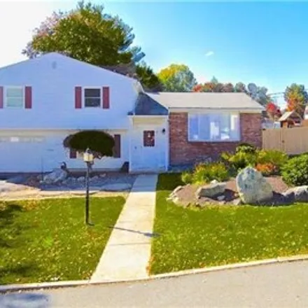 Buy this 4 bed house on 69 John F Kennedy Circle in North Providence, RI 02904