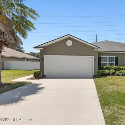 Rent this 3 bed house on 2454 Caney Wood Court in Jacksonville, FL 32218