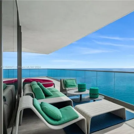 Rent this 4 bed condo on Residences By Armani Casa in 18975 Collins Avenue, Golden Shores