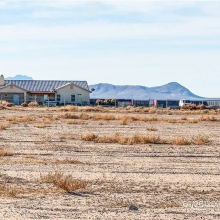 Buy this 4 bed house on 2708 Camellia Street in Pahrump, NV 89061