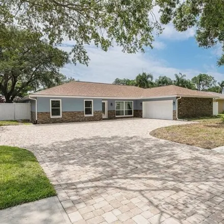 Buy this 4 bed house on 1975 Arvis Circle West in Largo, FL 33771