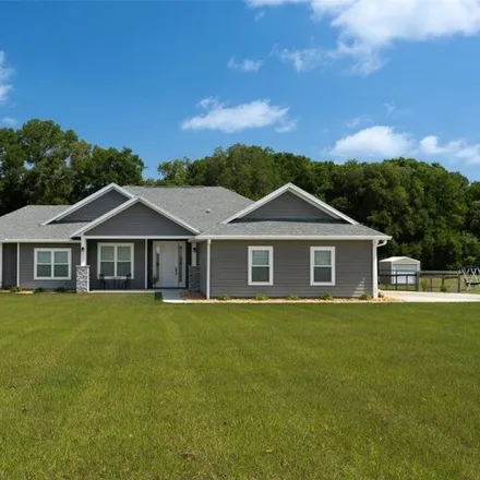 Buy this 5 bed house on 25172 Northwest 143rd Road in Alachua County, FL 32643