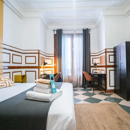 Rent this 9 bed room on Gran Vía in 36, 28013 Madrid