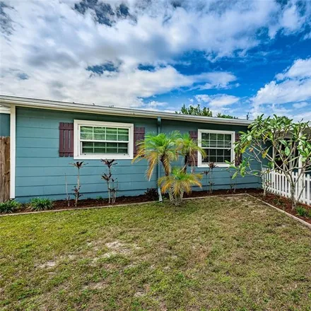Buy this 3 bed house on 7128 Organdy Drive North in Saint Petersburg, FL 33702