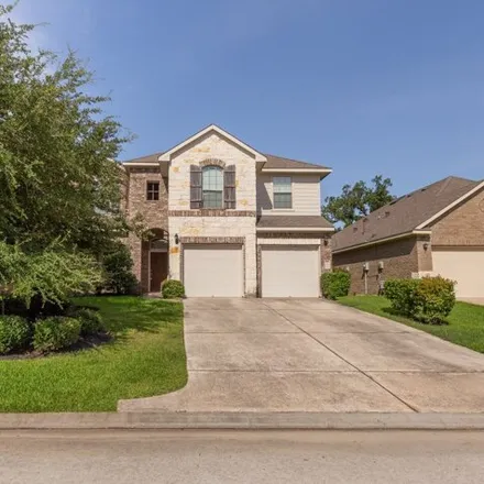 Rent this 4 bed house on 174 Black Swan Pl in Magnolia, Texas