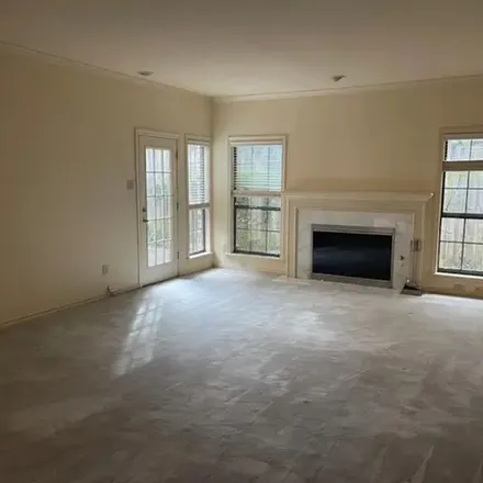 Rent this 3 bed townhouse on 12586 Montego Plaza in Dallas, TX 75230