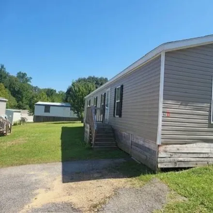 Rent this studio apartment on 1720 Hurricane Rd Lot 94 in Cottondale, Alabama