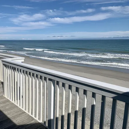 Buy this 2 bed condo on 1174 Sand Dollar Court in Kure Beach, NC 28449
