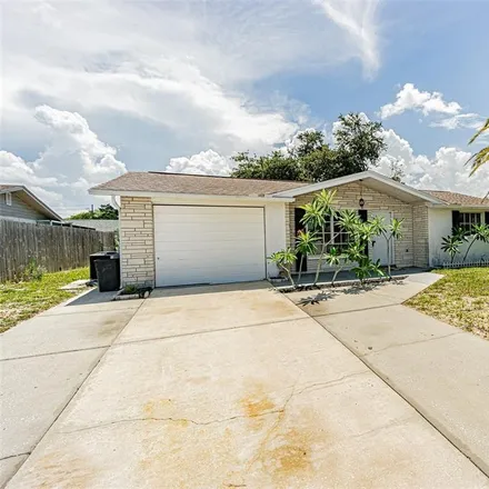 Buy this 2 bed house on 11112 White Oak Lane in Bayonet Point, FL 34668