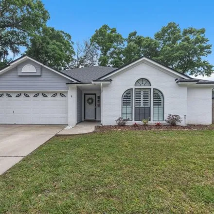 Buy this 4 bed house on 12464 North Windy Willows Drive in Jacksonville, FL 32225