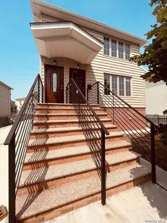 Buy this 8 bed house on 146-34 177th Street in New York, NY 11434