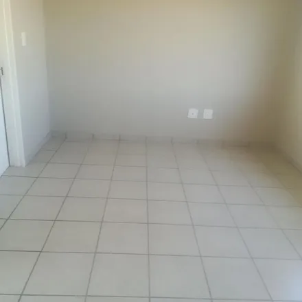 Rent this 2 bed apartment on Chute Drive in Fleurhof, Soweto