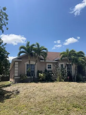 Buy this 4 bed house on 1078 Southwest Alexandria Avenue in Port Saint Lucie, FL 34953