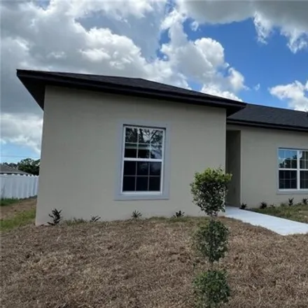 Rent this 3 bed house on 740 Halton Avenue Southwest in Palm Bay, FL 32908