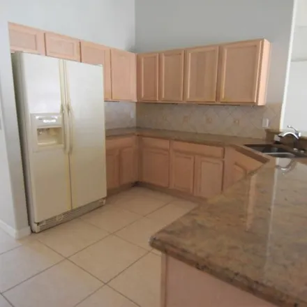 Rent this 4 bed apartment on 2270 Alton Road in Deltona, FL 32738