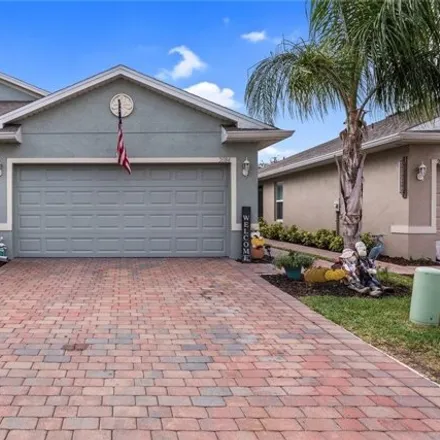 Buy this 3 bed house on 2090 Pigeon Plum Way in Herons Glen Golf and Country Club, Lee County