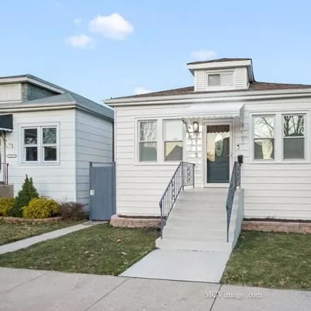 Buy this 2 bed house on 2115 North Marmora Avenue in Chicago, IL 60634
