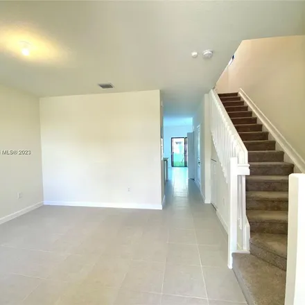 Rent this 3 bed apartment on West 111th Place in Hialeah, FL 33018