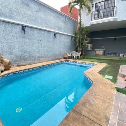 Buy this 4 bed house on Calle Hacienda La Punta in Circunvalación Oblatos, 44700 Guadalajara