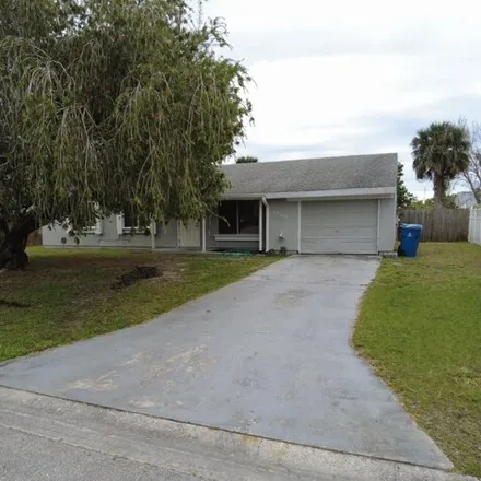Rent this 3 bed house on 1220 Linmoor Circle Northeast in Palm Bay, FL 32907