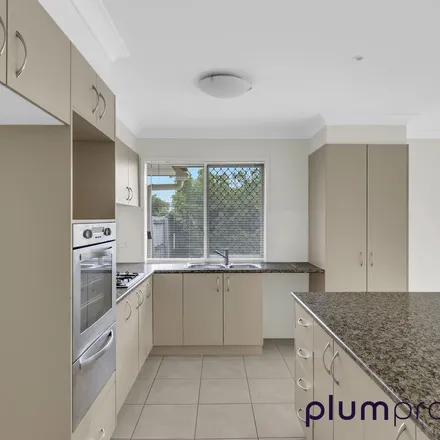 Rent this 4 bed apartment on Willowtree Drive in Flinders View QLD 4305, Australia