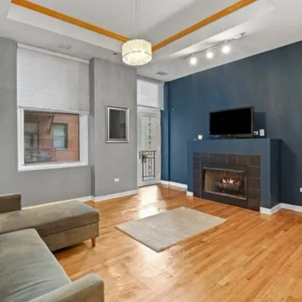 Rent this 2 bed condo on 208 W Washington St