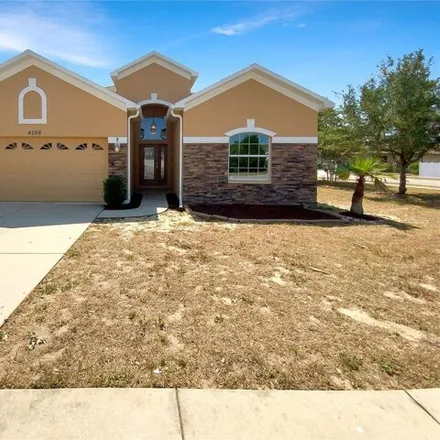 Buy this 4 bed house on 12937 Keefer Court in Spring Hill, FL 34609