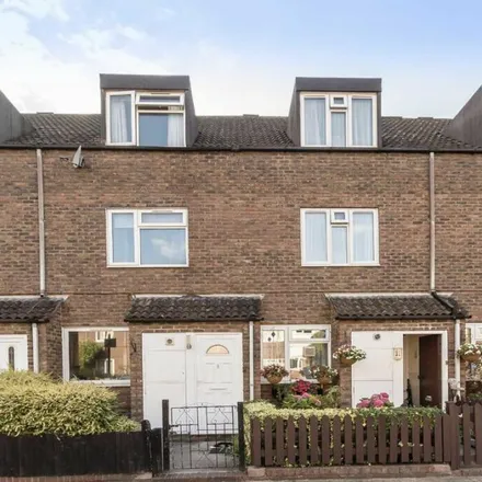 Rent this 3 bed townhouse on Coppock Close in London, SW11 3PX