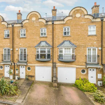 Buy this 4 bed townhouse on Duchess Court in Walton-on-Thames, KT13 9HN