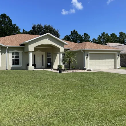 Buy this 4 bed house on 32 Lancelot Drive in Palm Coast, FL 32137