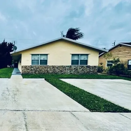 Rent this 2 bed house on 2326 Harding Street in Hollywood, FL 33020